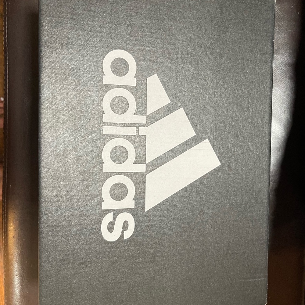 Brand new adidas shoes. Never been wore, still in original box and wrapping.